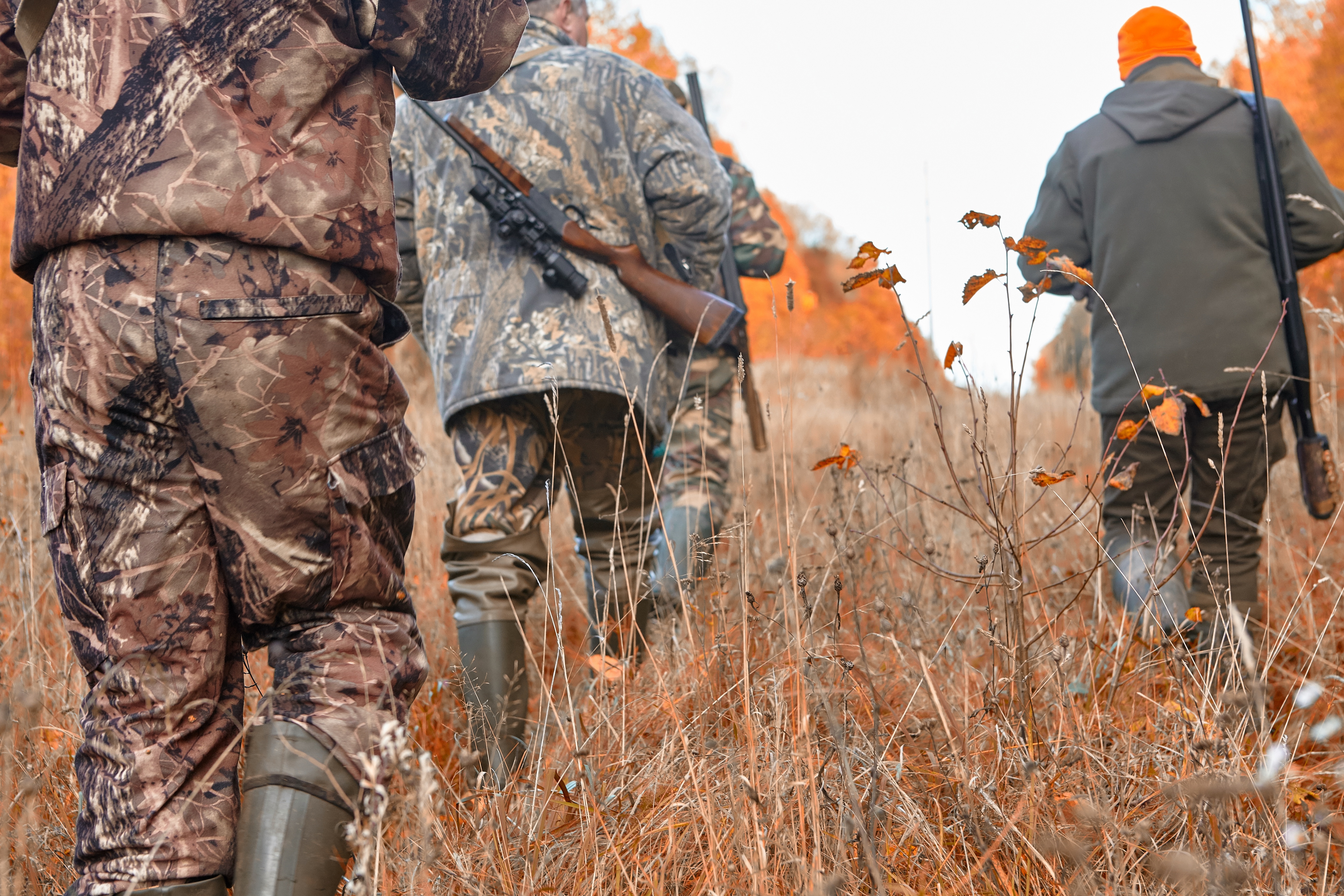Oklahoma hunter walking through a field